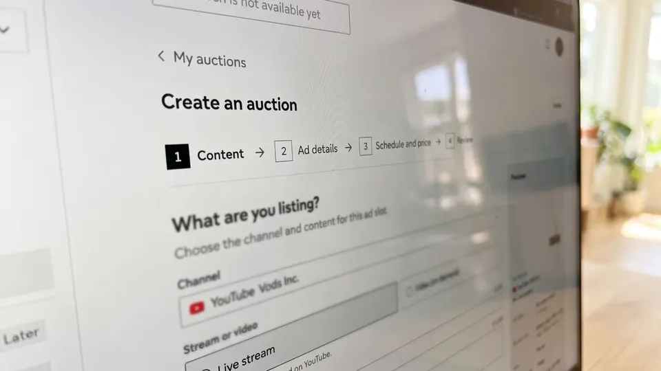A laptop showing the Create an auction form on Vods, at its first step, Content.